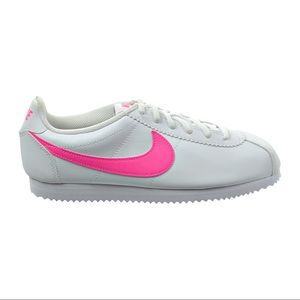 Pink and White Nike Cortez.